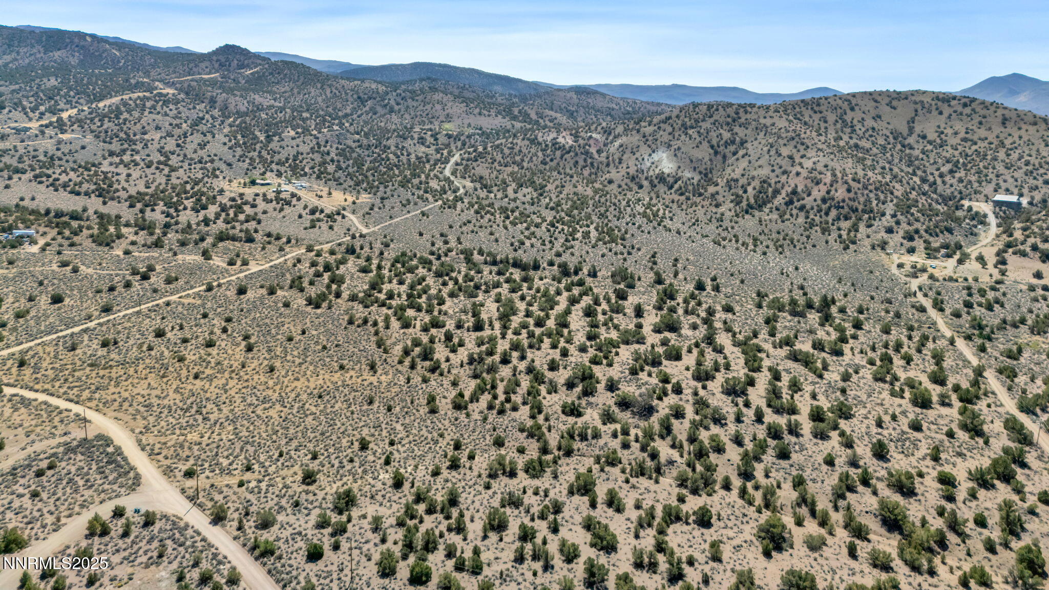 0 Right Hand Canyon Road, Unit 0RIGHT HAND CANYON RD Reno, NV 89510 - Photo 4 of 14 a view of a dry yard with mountains in the background