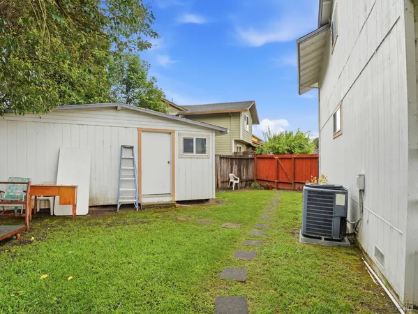 a view of a garage with a table and chairs