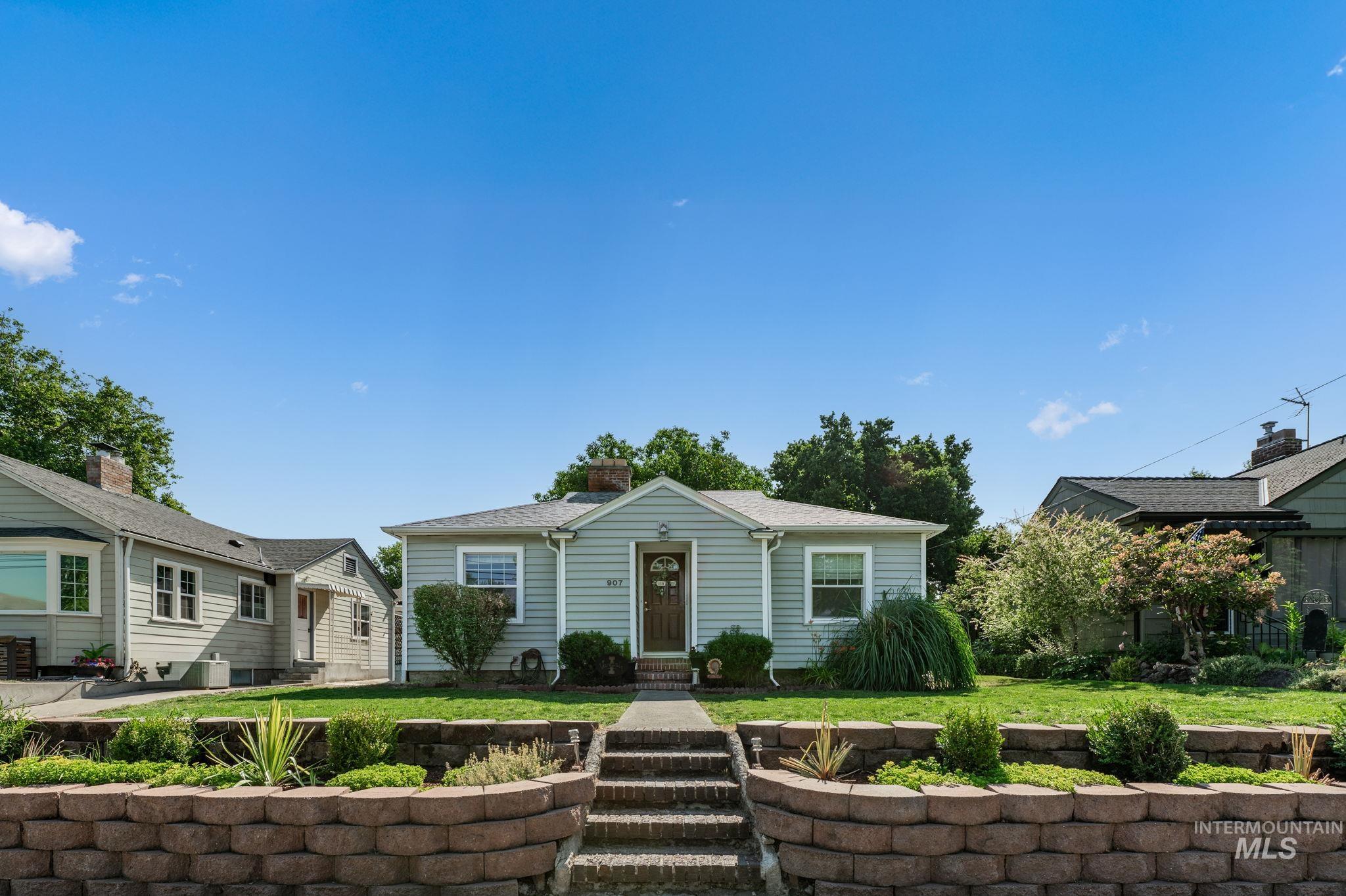 Bungalow-style home featuring a front yard