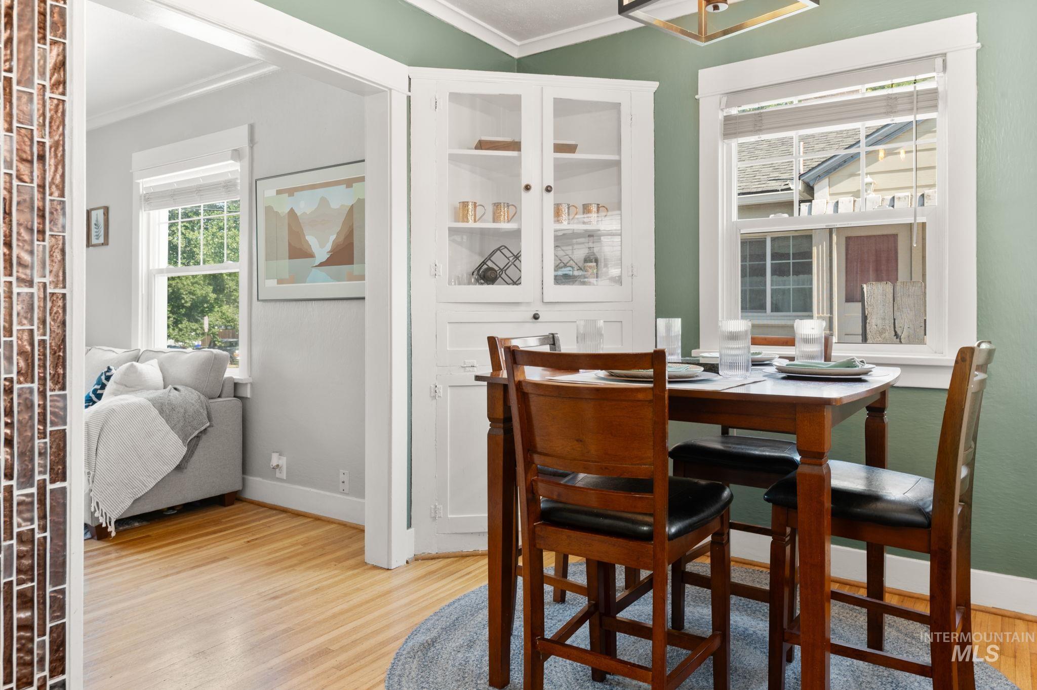 907 3rd Street Lewiston, ID 83501 - Photo 13 of 26 Dining area featuring ornamental molding and light wood-style flooring