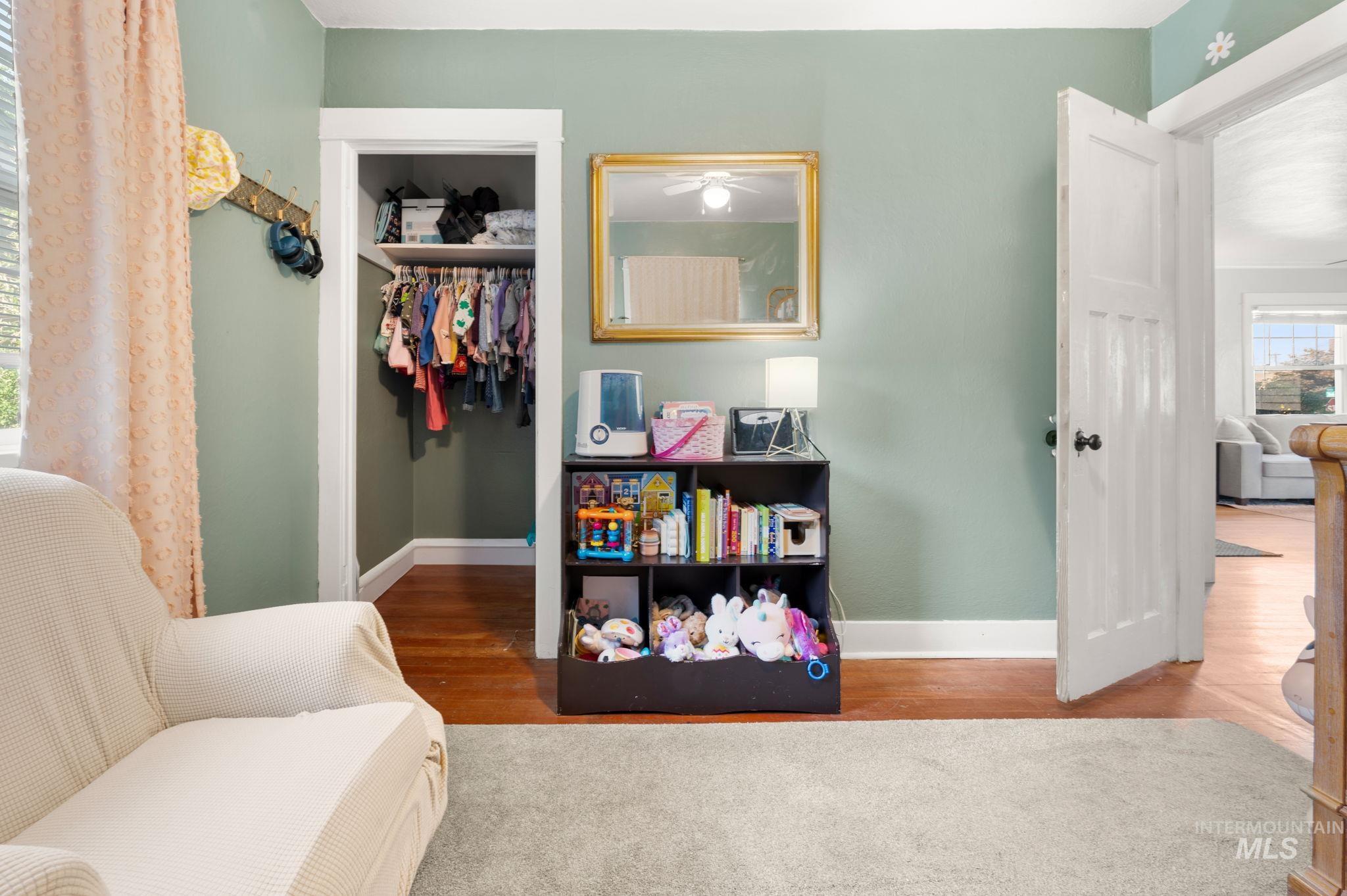907 3rd Street Lewiston, ID 83501 - Photo 17 of 26 Living area featuring light wood finished floors