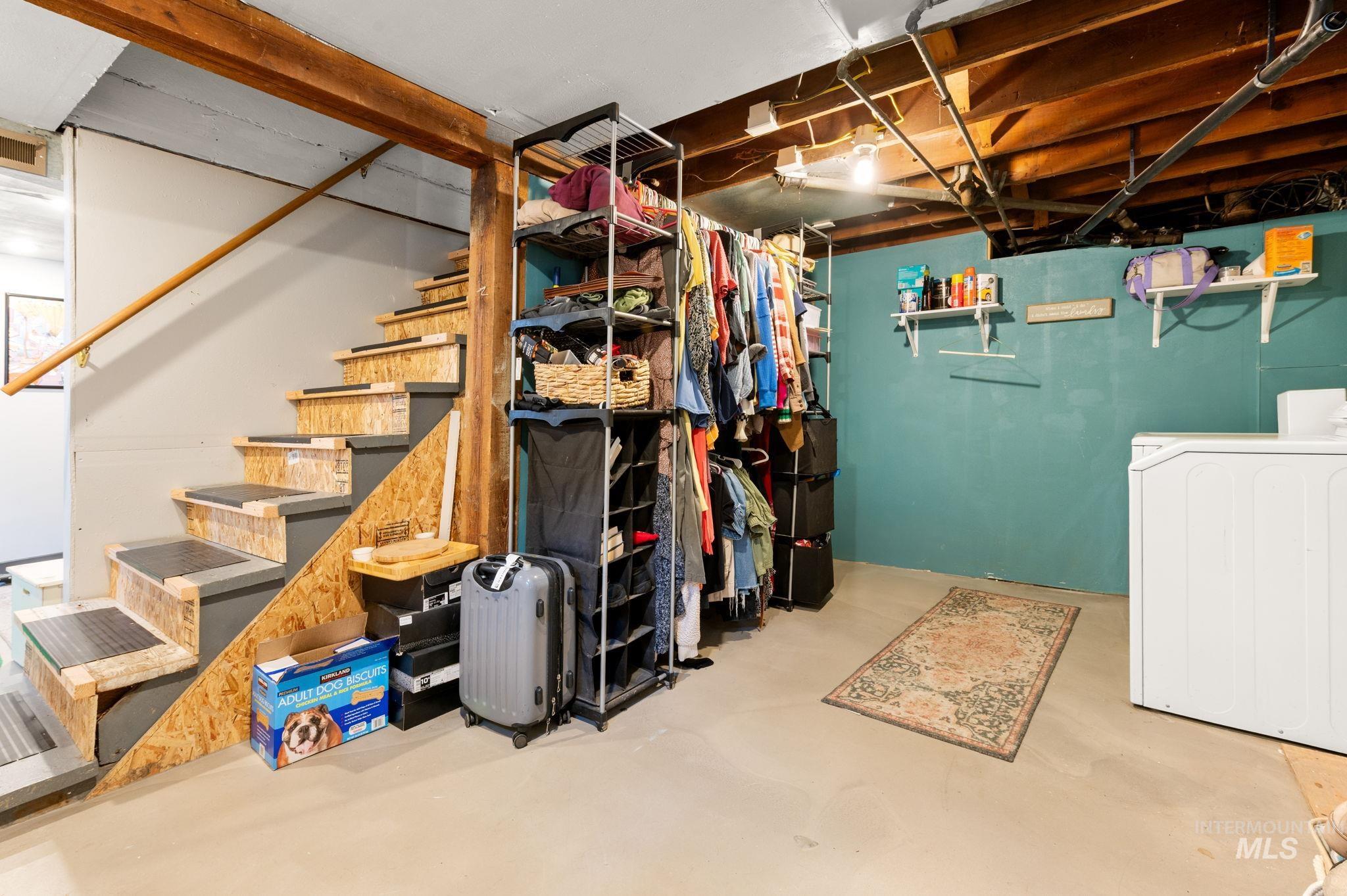 907 3rd Street Lewiston, ID 83501 - Photo 19 of 26 Unfinished basement featuring washer / clothes dryer and stairway