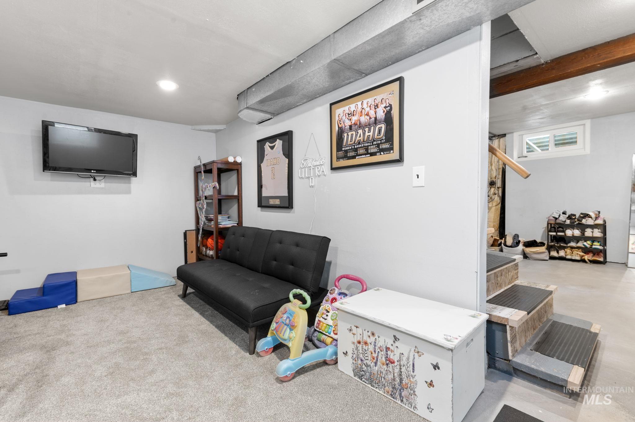 907 3rd Street Lewiston, ID 83501 - Photo 21 of 26 Rec room featuring concrete floors and recessed lighting