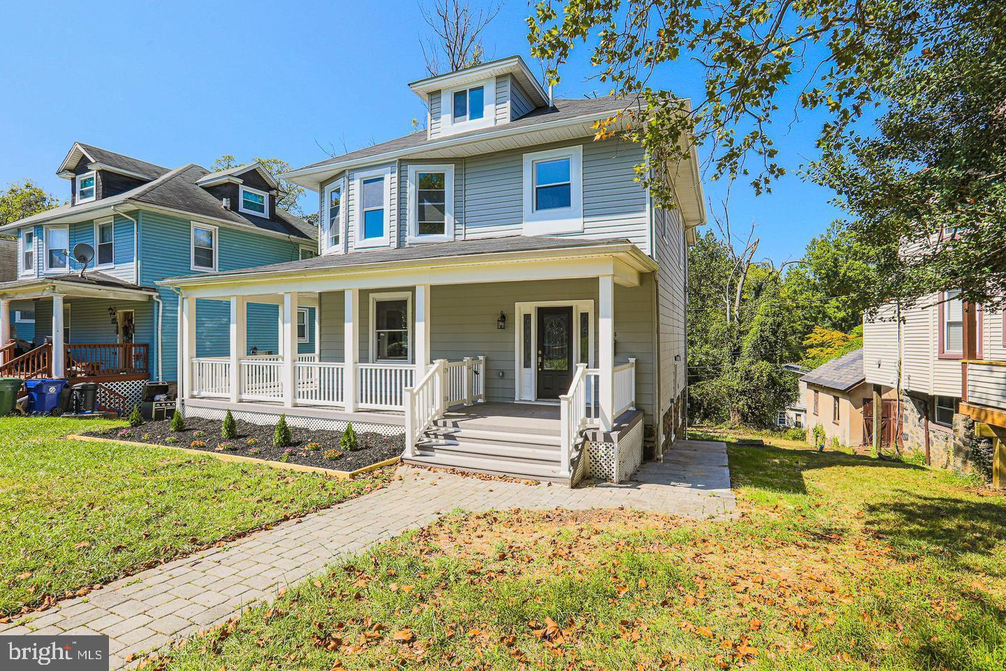 1904 Cedric Road Baltimore, MD 21216 - Photo 15 of 16 a front view of a house with a yard