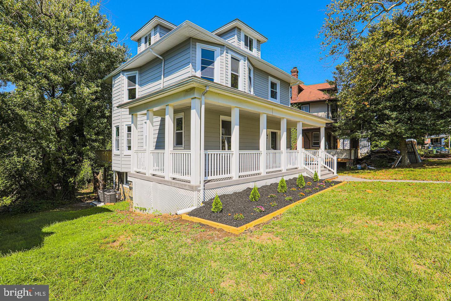 1904 Cedric Road Baltimore, MD 21216 - Photo 16 of 16 a front view of a house with yard and green space