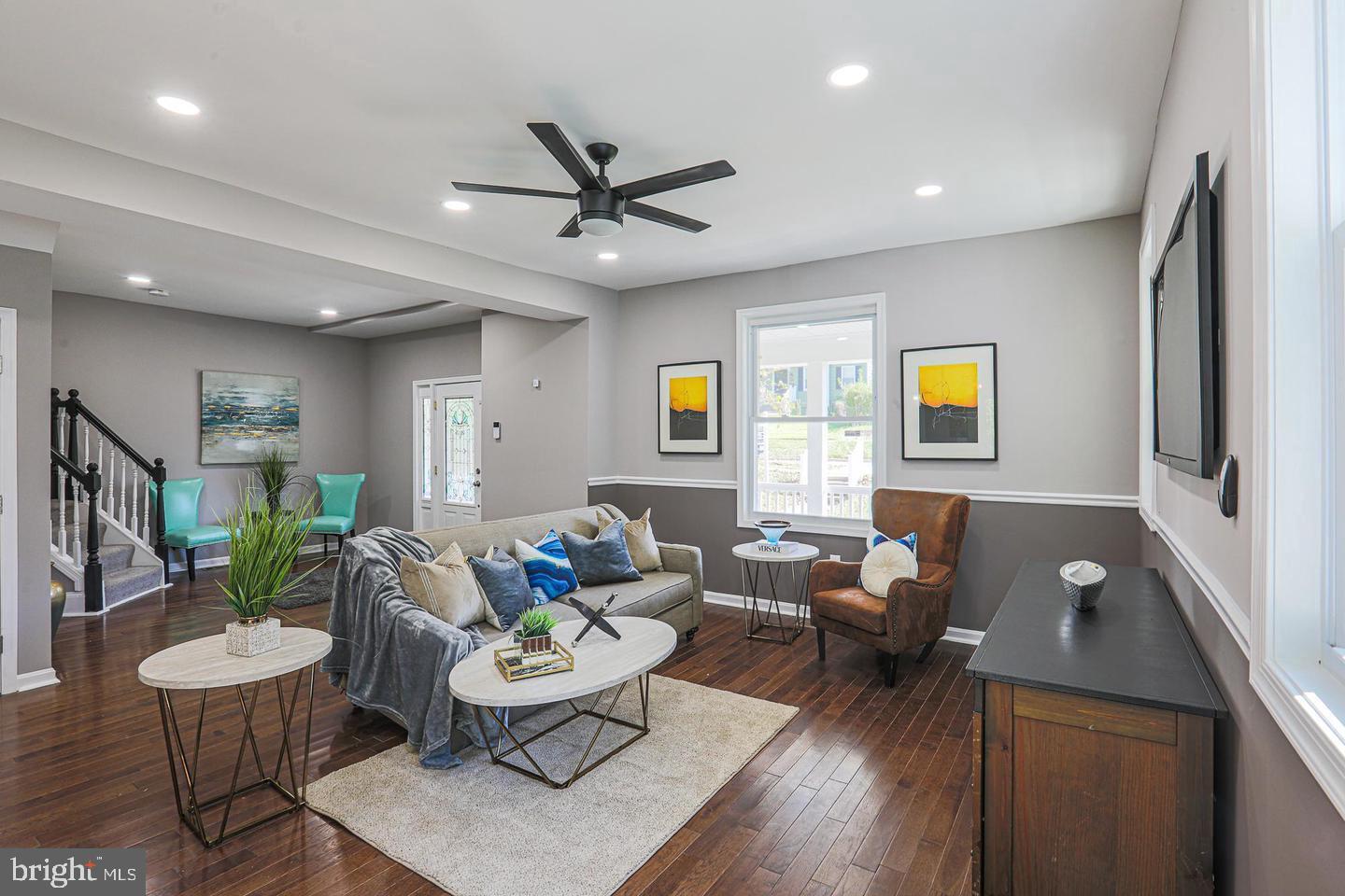 1904 Cedric Road Baltimore, MD 21216 - Photo 8 of 16 a living room with furniture and a wooden floor