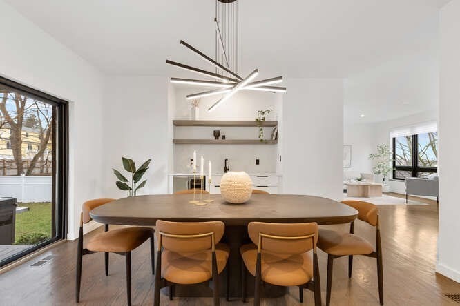 46 Beverly Road Arlington, MA 02474 - Photo 13 of 42 a view of a dining room with furniture and wooden floor