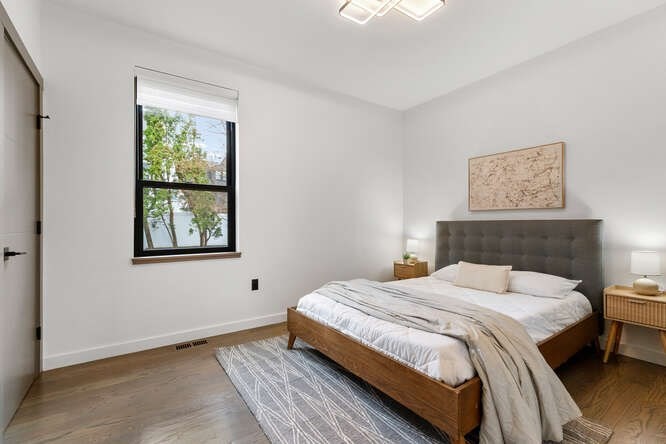 46 Beverly Road Arlington, MA 02474 - Photo 16 of 42 a bedroom with a bed and a window