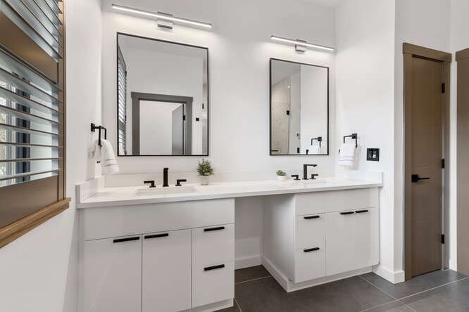 46 Beverly Road Arlington, MA 02474 - Photo 23 of 42 a bathroom with a double vanity sink mirror and