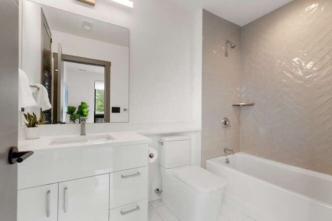 46 Beverly Road Arlington, MA 02474 - Photo 28 of 42 a bathroom with a sink and a mirror