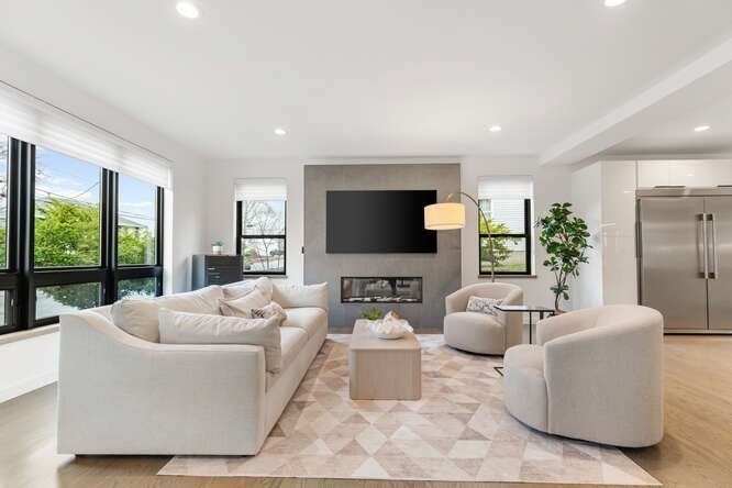 46 Beverly Road Arlington, MA 02474 - Photo 7 of 42 a living room with furniture and a flat screen tv