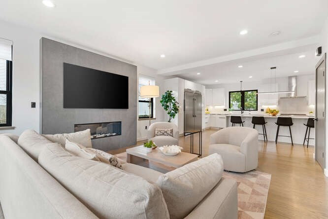 46 Beverly Road Arlington, MA 02474 - Photo 9 of 42 a living room with furniture and a flat screen tv