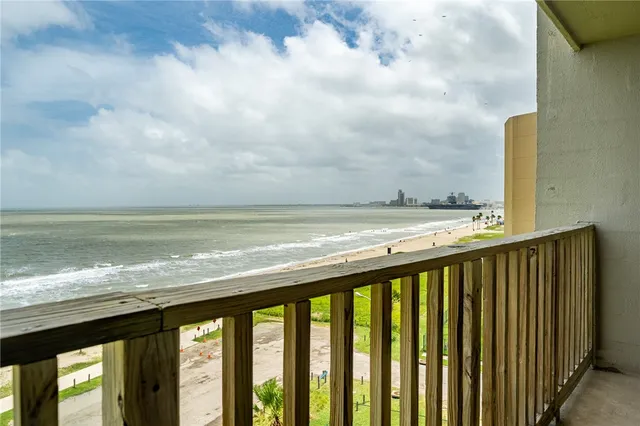 a balcony with a swing