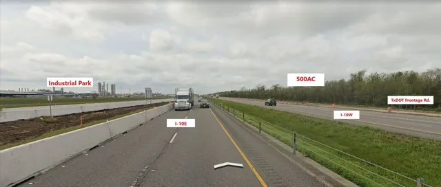 a view of a city street from a balcony