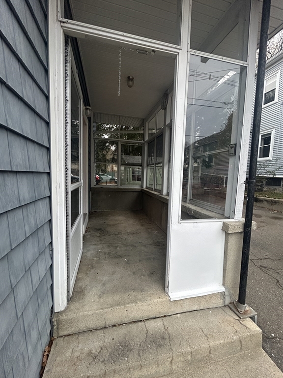 415 Washington Street, Unit 1 Winchester, MA 01890 - Photo 5 of 18 a view of a porch