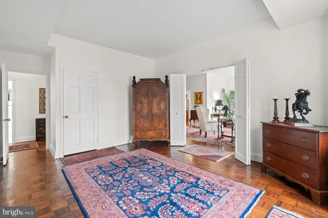 a living room with a rug