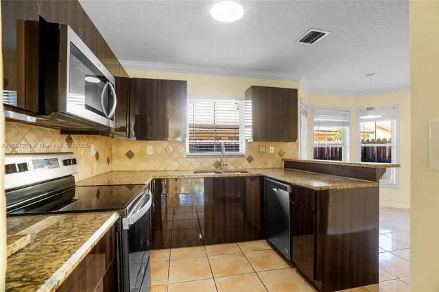 $495,000 | 239 Mahogany Terrace, Davie, FL 33325