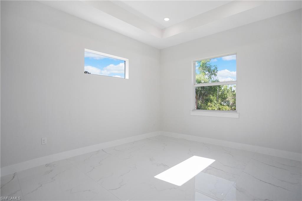 2811 14th Street West Lehigh Acres, FL 33971 - Photo 14 of 33 an empty room with a window