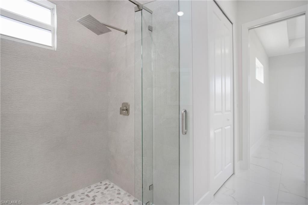 2811 14th Street West Lehigh Acres, FL 33971 - Photo 19 of 33 a bathroom with a shower