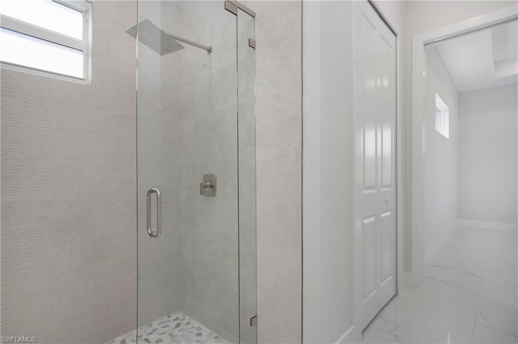 2811 14th Street West Lehigh Acres, FL 33971 - Photo 20 of 33 a bathroom with a shower