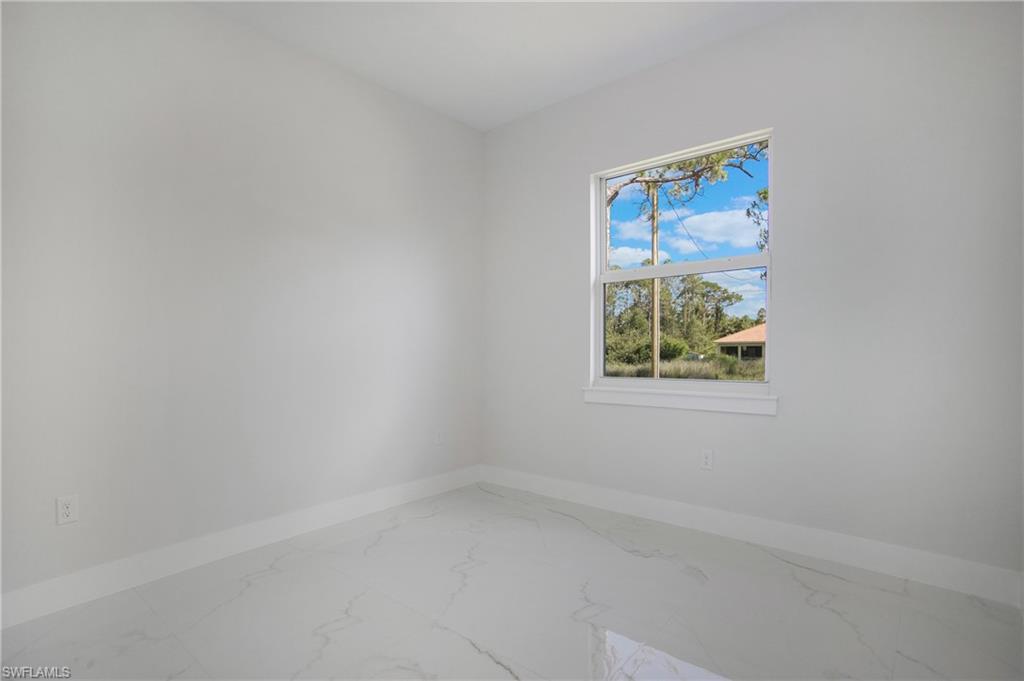 2811 14th Street West Lehigh Acres, FL 33971 - Photo 21 of 33 a small space with a window