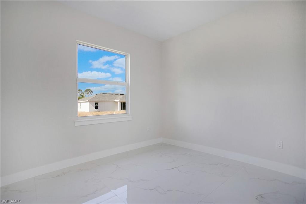 2811 14th Street West Lehigh Acres, FL 33971 - Photo 24 of 33 a small space with a window