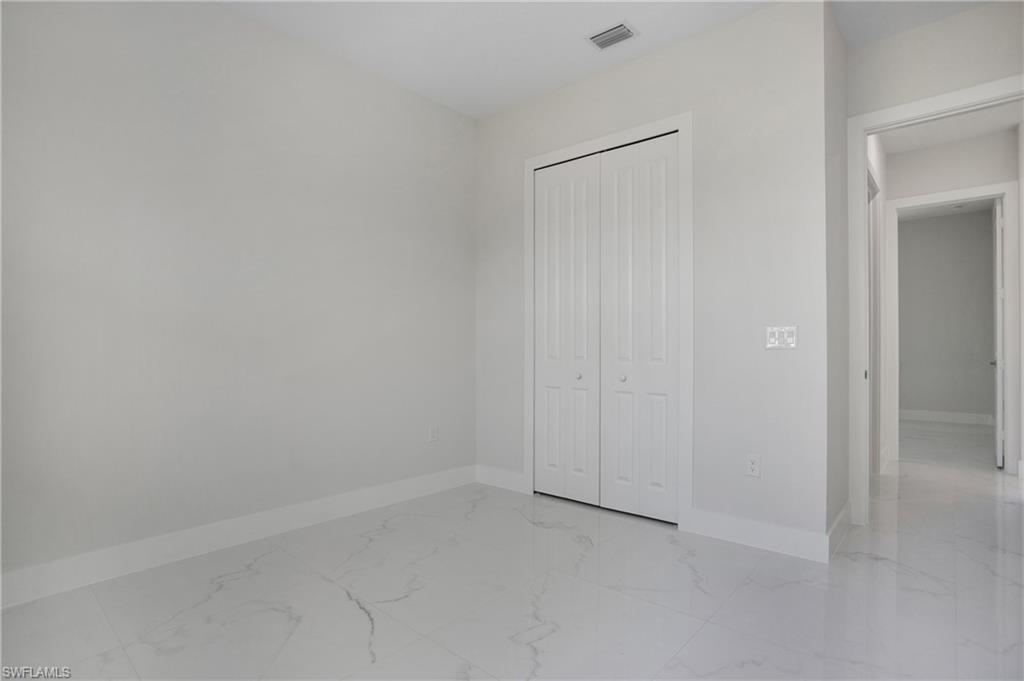 2811 14th Street West Lehigh Acres, FL 33971 - Photo 25 of 33 a view of an empty room