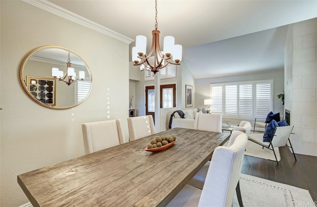 22805 Rio Lobos Road Diamond Bar, CA 91765 - Photo 11 of 50 a view of a dining room with furniture window and wooden floor
