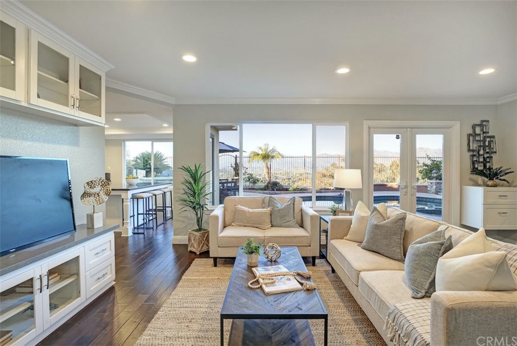 22805 Rio Lobos Road Diamond Bar, CA 91765 - Photo 19 of 50 a living room with furniture fireplace and a table