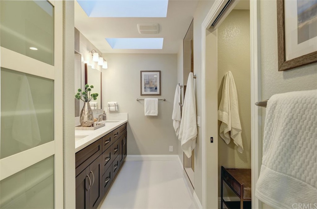22805 Rio Lobos Road Diamond Bar, CA 91765 - Photo 29 of 50 a spacious bathroom with a double vanity sink a mirror and a shower