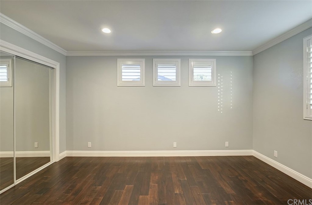 22805 Rio Lobos Road Diamond Bar, CA 91765 - Photo 41 of 50 a view of an empty room with wooden floor and a window