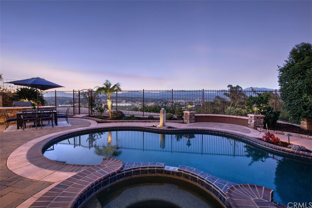 22805 Rio Lobos Road Diamond Bar, CA 91765 - Photo 47 of 50 a view of a swimming pool with seating area