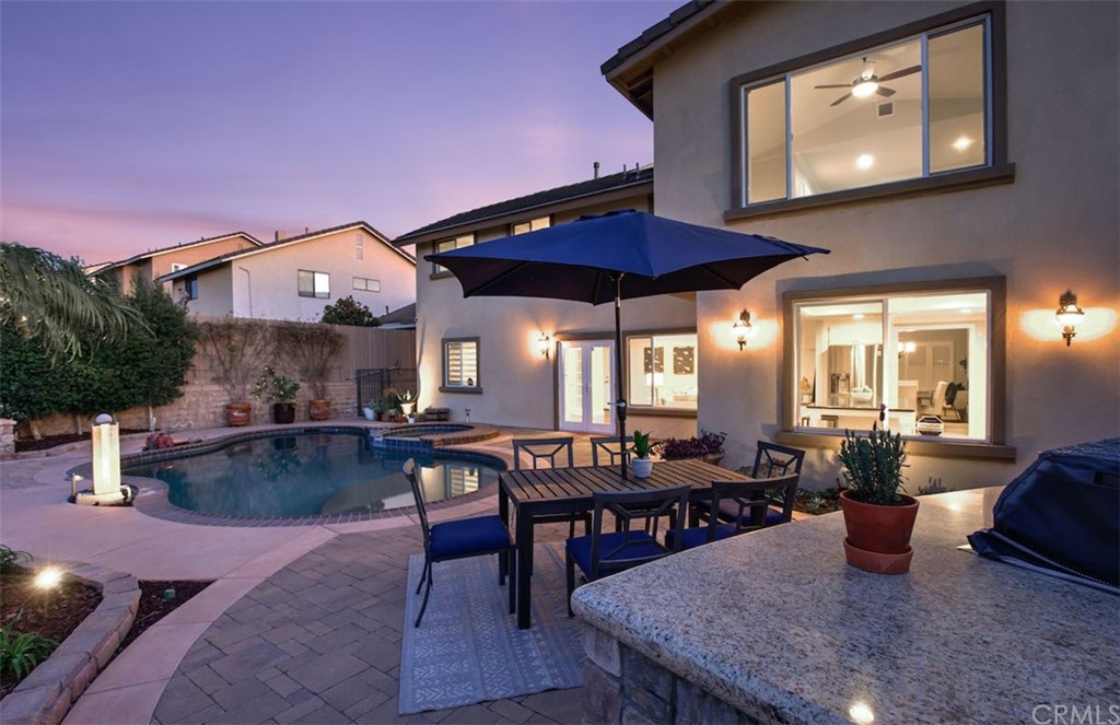 22805 Rio Lobos Road Diamond Bar, CA 91765 - Photo 48 of 50 a view of a dining room with furniture and chandelier