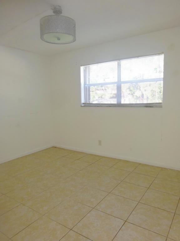 450 Southwest 2nd Avenue, Unit 107A Boca Raton, FL 33432 - Photo 10 of 21 The Back Bedroom faces east!