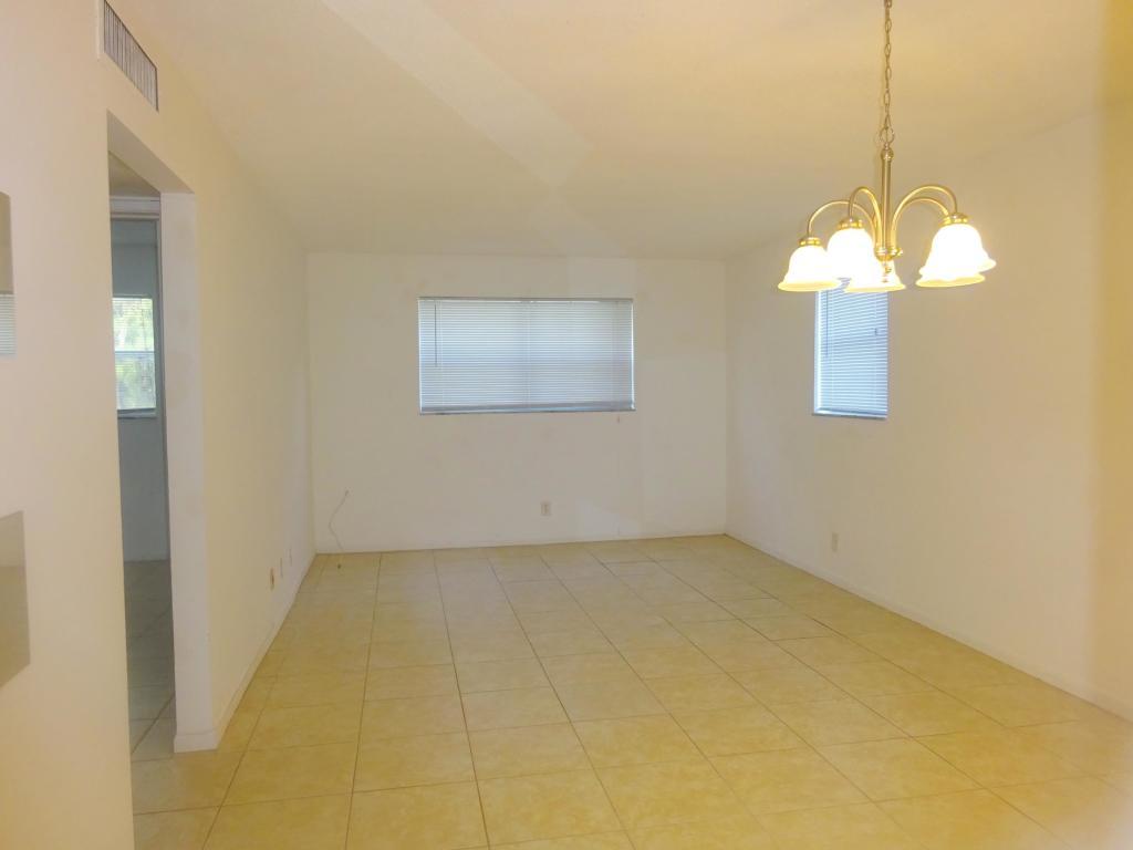 450 Southwest 2nd Avenue, Unit 107A Boca Raton, FL 33432 - Photo 4 of 21 Completely Tiled!