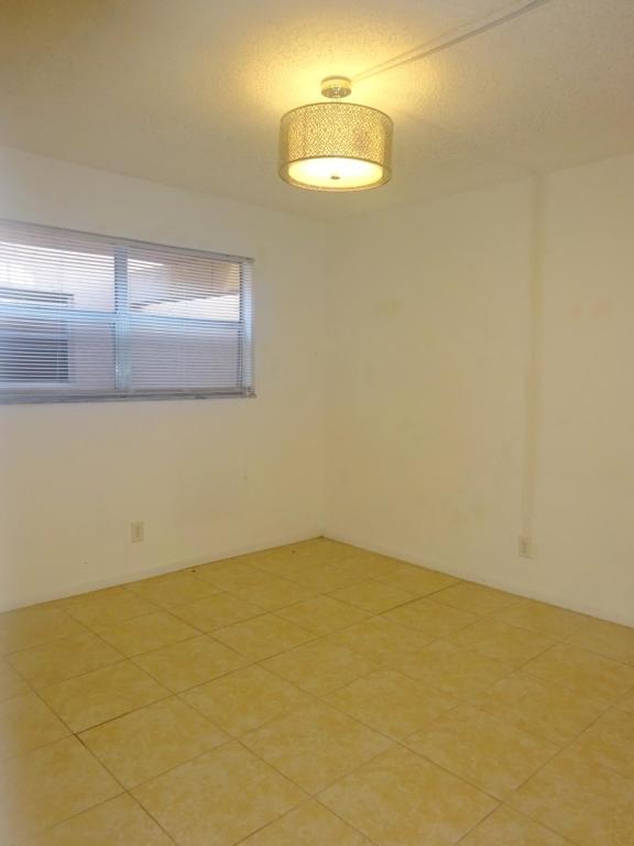 450 Southwest 2nd Avenue, Unit 107A Boca Raton, FL 33432 - Photo 6 of 21 Front Bedroom