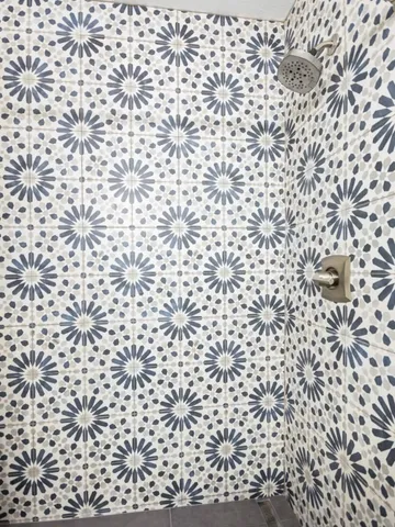 a bathroom with a shower curtain