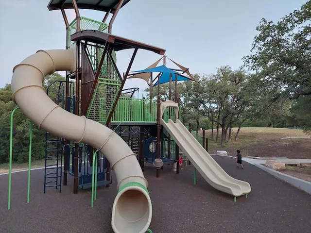 a view of a chairs and table in the patio