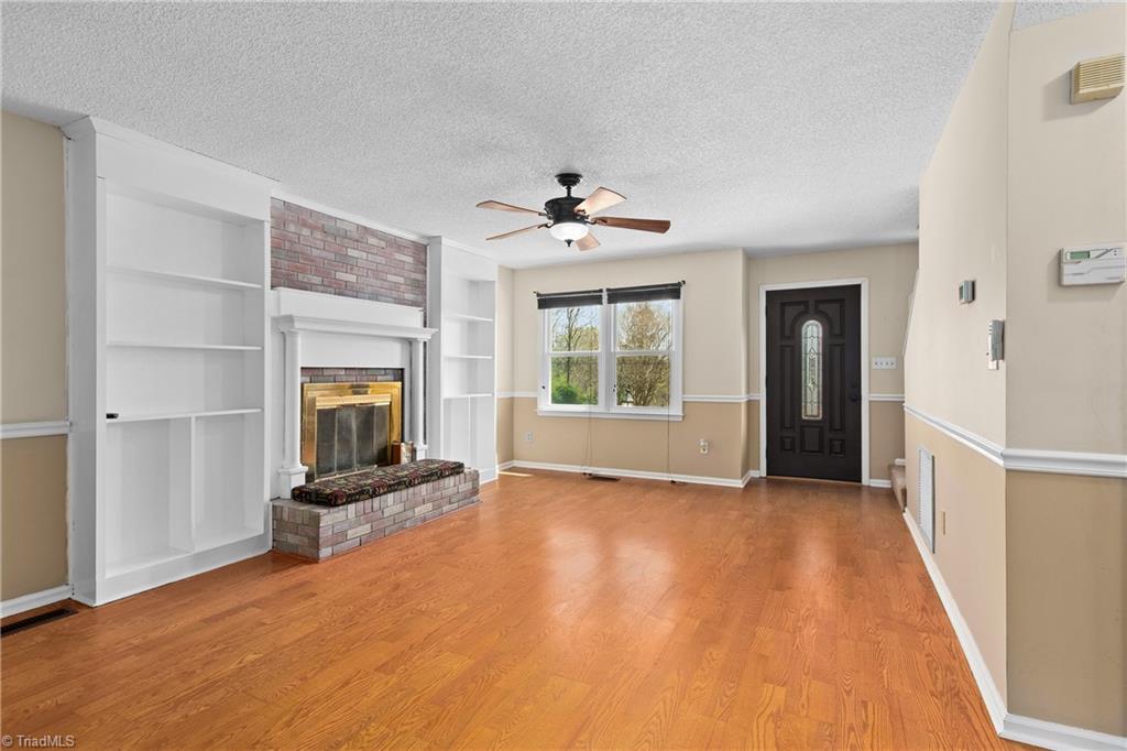 3954 Evergreen Drive Trinity, NC 27370 - Photo 4 of 50 Living room with built in shelving...