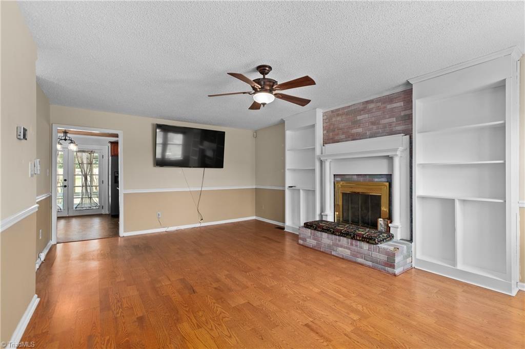 3954 Evergreen Drive Trinity, NC 27370 - Photo 6 of 50 Living room, New gas logs, mounted TV to remain