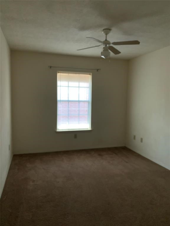 3801 College Main Street, Unit AD Bryan, TX 77801 - Photo 12 of 18 an empty room with a window