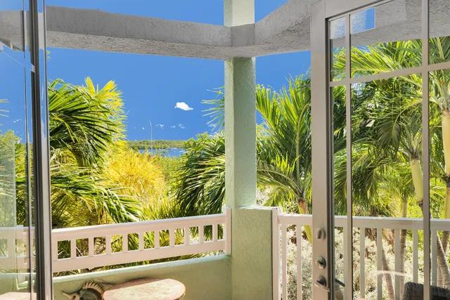 a view of a door with a tree