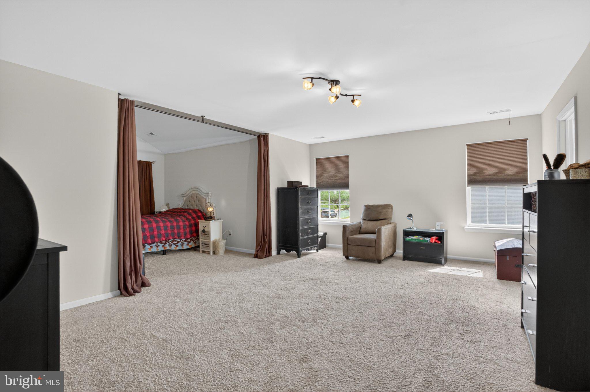 1105 Cardigan Road Middletown, DE 19709 - Photo 31 of 65 Spacious primary bedroom with sitting room