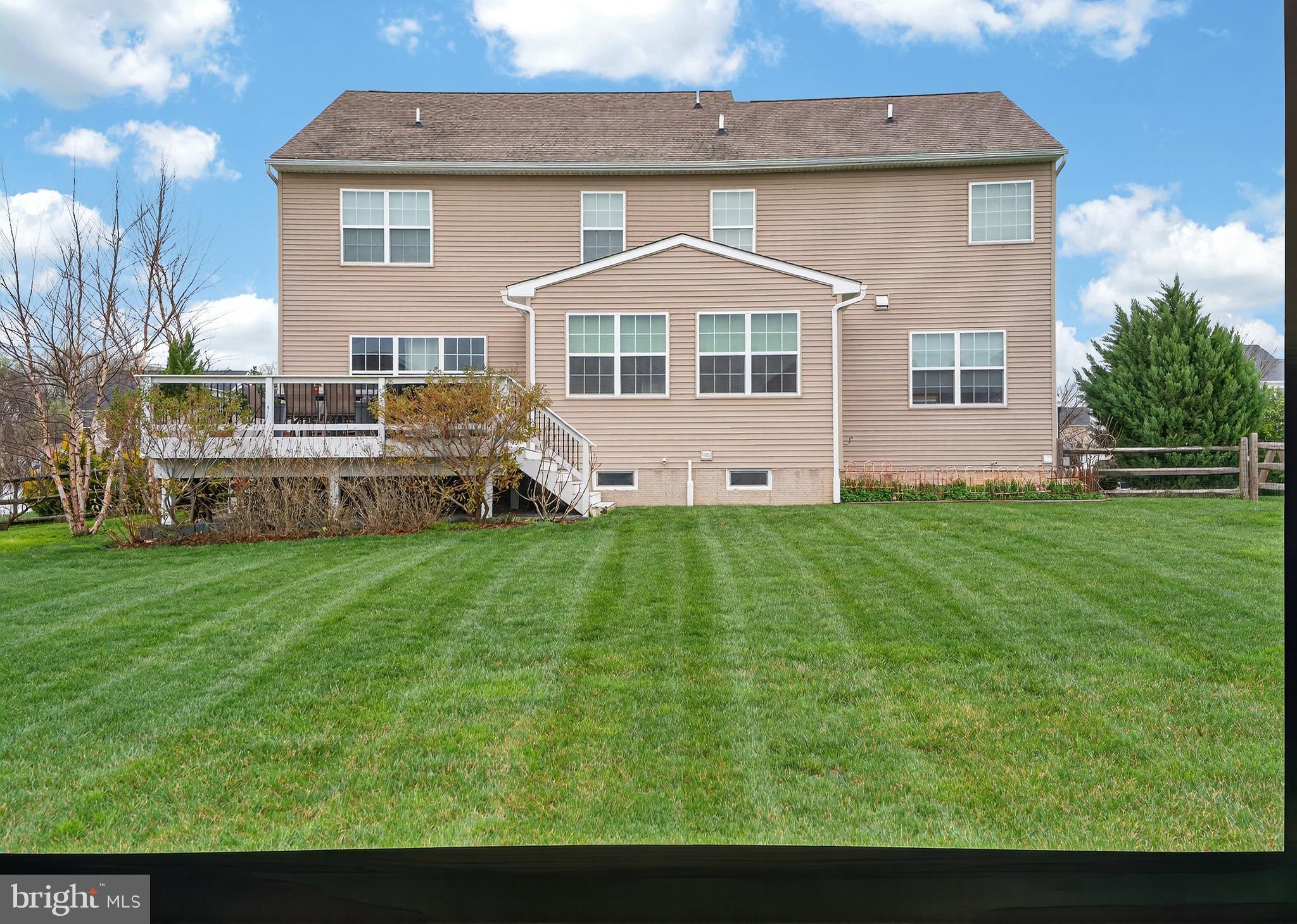 1105 Cardigan Road, Unit 1630 Middletown, DE 19709 - Photo 8 of 27 REAR OF HOME WITH SPACIOUS DECK