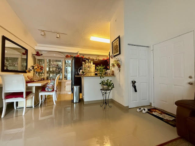 741 Lyons Road, Unit 17201 Coconut Creek, FL 33063 - Photo 13 of 45 a view of a room with gym equipment