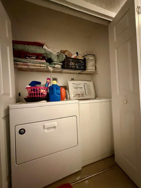 741 Lyons Road, Unit 17201 Coconut Creek, FL 33063 - Photo 23 of 45 a close up view of washer and dryer