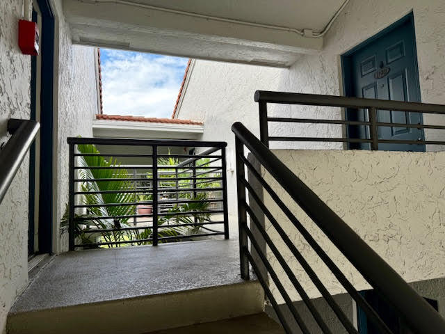 741 Lyons Road, Unit 17201 Coconut Creek, FL 33063 - Photo 5 of 45 a view of entryway