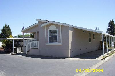 84 Cardinal Way Santa Rosa, CA 95409 - Photo 1 of 7 a view of an house with wooden fence