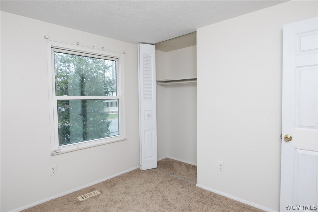 1136 Oldbury Road Midlothian, VA 23113 - Photo 17 of 36 a view of an empty room with a window