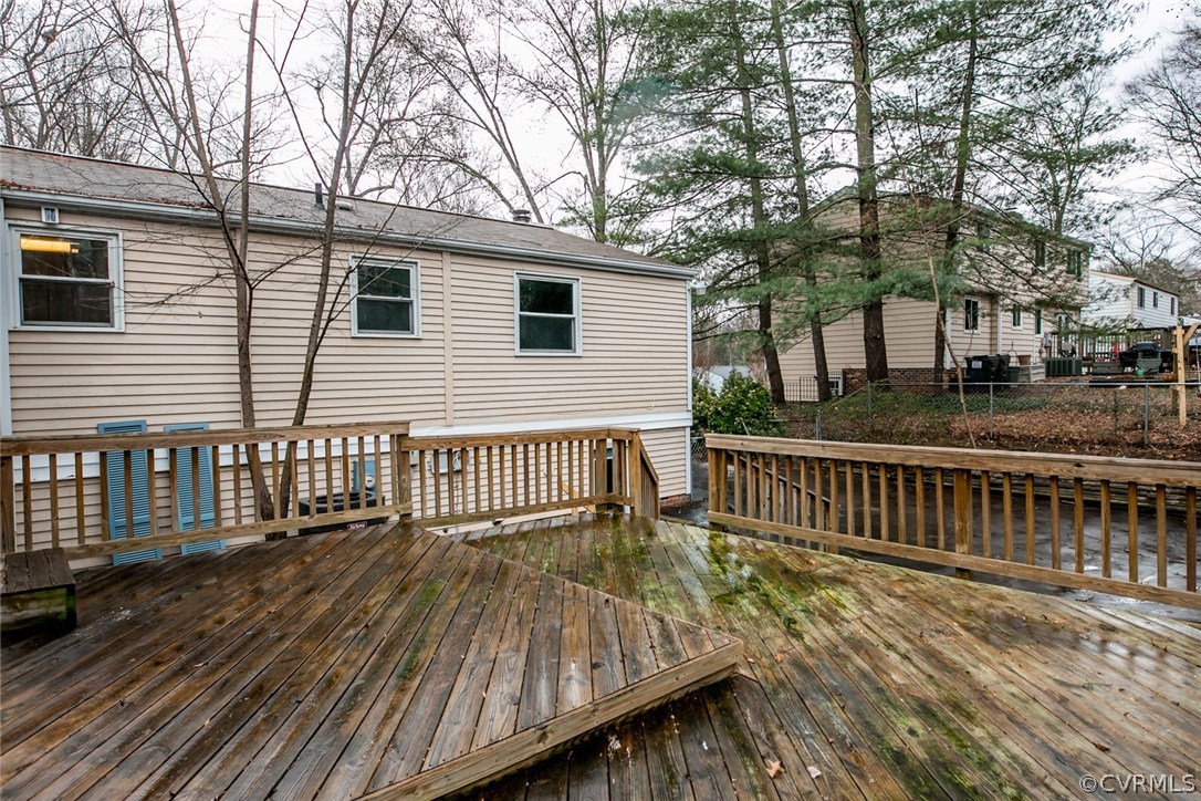 1136 Oldbury Road Midlothian, VA 23113 - Photo 32 of 36 a view of a wooden deck and a yard